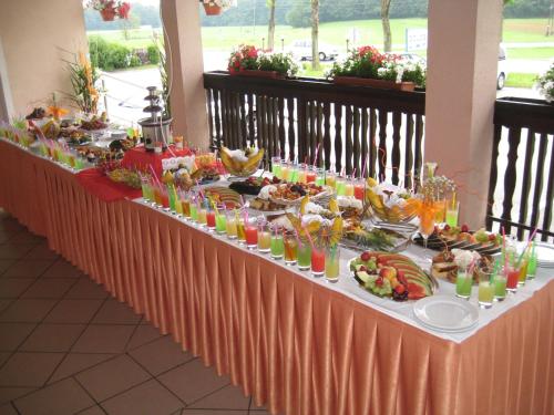a buffet table with food and drinks on it at Gostisce Golob in Zgornja Polskava