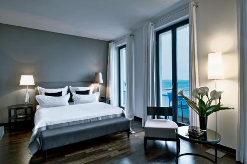 Postelja oz. postelje v sobi nastanitve A-ROSA Collection Hotel Ceres am Meer