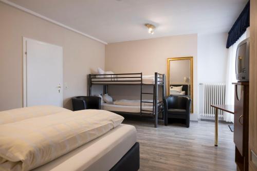 Poschodová posteľ alebo postele v izbe v ubytovaní Landgasthaus Blick ins Tal