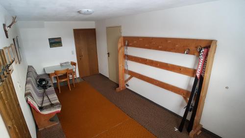 a hallway with a barn door in a room at Haus Christof in Holzgau