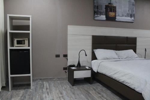 Un ou plusieurs lits dans un hébergement de l'établissement Best Western El Sitio Hotel
