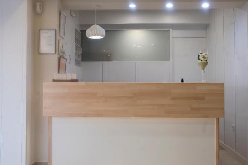 a counter in a room with a white wall at Hotel Tolosa in Salou