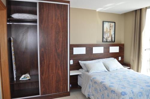 Katil atau katil-katil dalam bilik di Flat Particular Jade Brasilia 1004 e 1006 Com Garagem