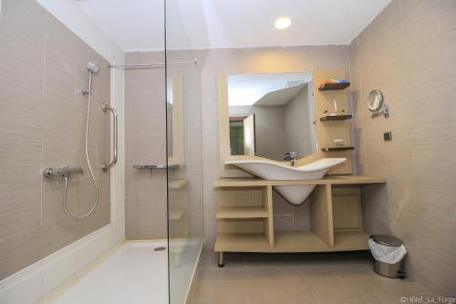 Koupelna v ubytování Hotel LAFORGE