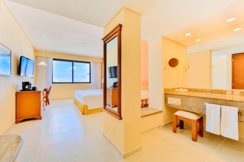 Ванная комната в Occidental Tucancún - All Inclusive