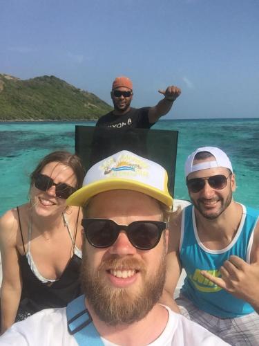 a group of people on a boat in the water at Posada Ashanty in Providencia