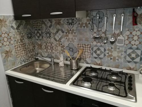 A kitchen or kitchenette at B&B A casa dell'artista