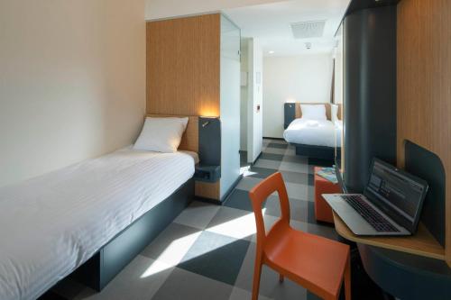 Letto o letti in una camera di easyHotel The Hague Scheveningen Beach