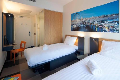Letto o letti in una camera di easyHotel The Hague Scheveningen Beach