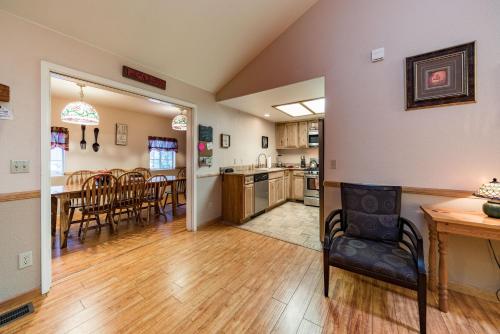 a kitchen and living room with a table and chairs at Inside Yosemite Winter Wonderland in Yosemite West