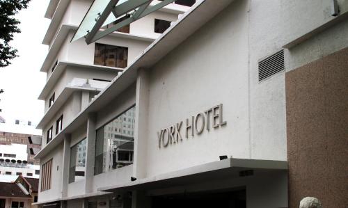 a building with the words york hotel on it at York Hotel in Singapore