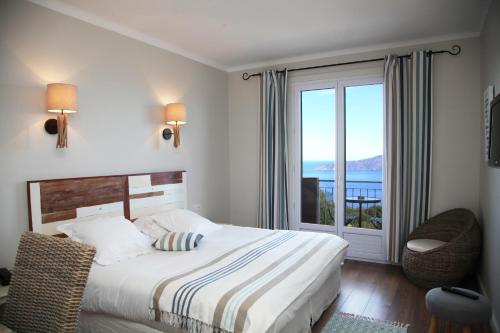 Postel nebo postele na pokoji v ubytování Hotel Scandola