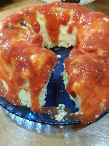 two pieces of cake on a blue plate at Pousada Recanto das Águas in Lumiar