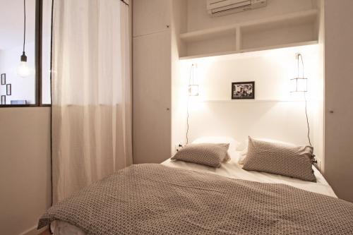 Cama ou camas em um quarto em Appartements Dom Vaissette