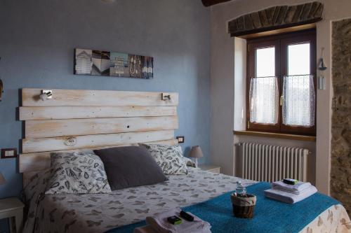Katil atau katil-katil dalam bilik di Agriturismo Angiò nel Cerè