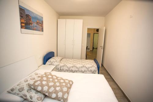 Кровать или кровати в номере Casa di Joy