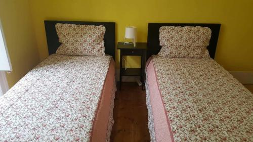 Katil atau katil-katil dalam bilik di Cenário Catita Hostel