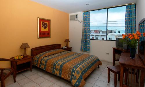 Cama o camas de una habitación en Hostal Solar Del Puerto