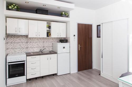 Una cocina o zona de cocina en Apartment Lapad Beach