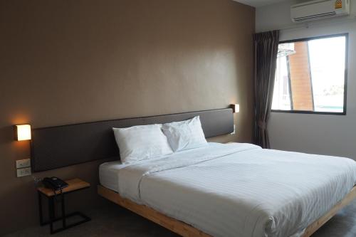 Een bed of bedden in een kamer bij A3 Living