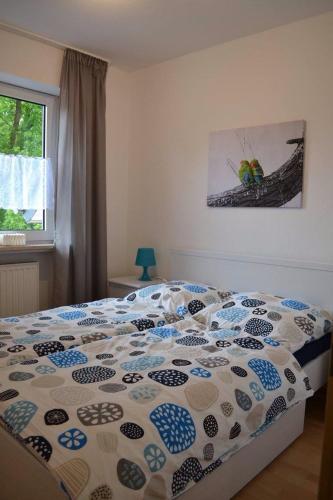 Ένα ή περισσότερα κρεβάτια σε δωμάτιο στο Ferienhaus Munterley