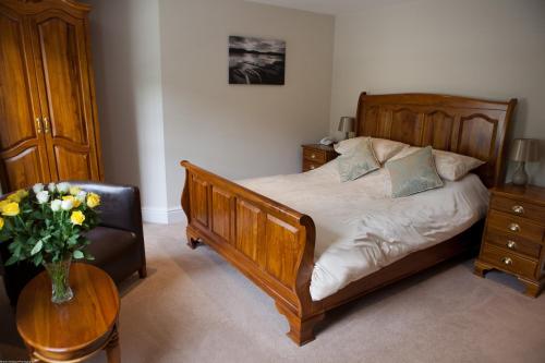 Letto o letti in una camera di Rose in Vale Country House Hotel