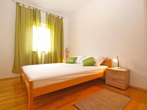 Posteľ alebo postele v izbe v ubytovaní Apartments Stjepan 1573
