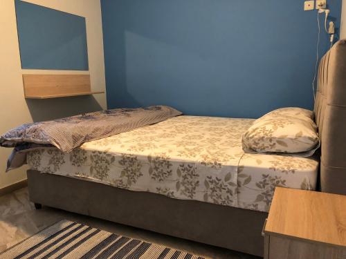 Ein Bett oder Betten in einem Zimmer der Unterkunft Office-Studio Theoxaris