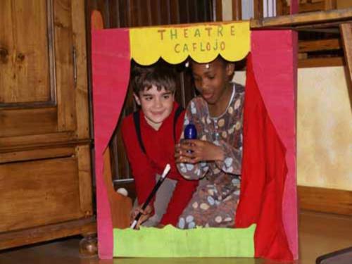 a picture of two children in a picture frame at Gite Auberge La Soulan - gite de montagne in Cathervielle