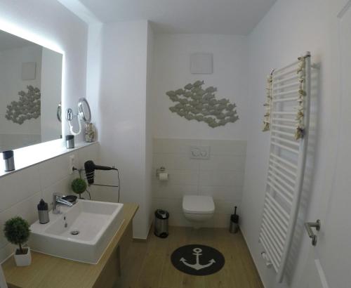 Kylpyhuone majoituspaikassa Villa Louisa - Liegestuhl 45