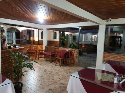 Uma área de estar em Pousada Recanto das Águas