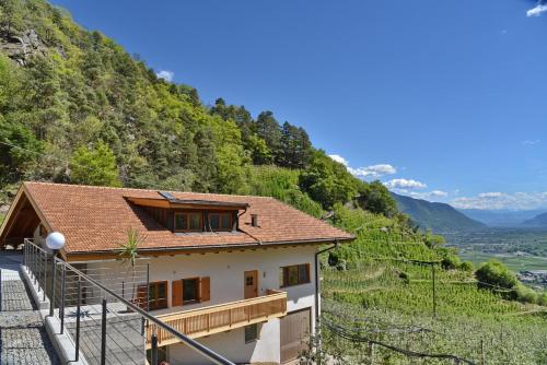a house on the side of a hill at Residence Blumenthalerhof in Lagundo