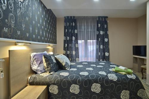 Cama o camas de una habitación en Hostel Lukas