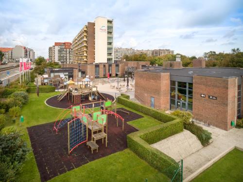 an aerial view of a park with a playground at Floreal Nieuwpoort in Nieuwpoort