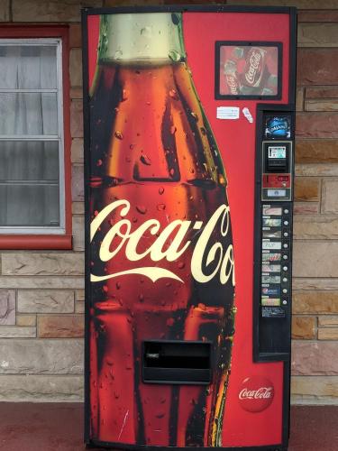 a bottle of cocacola soda vending machine at Benton Inn in Benton