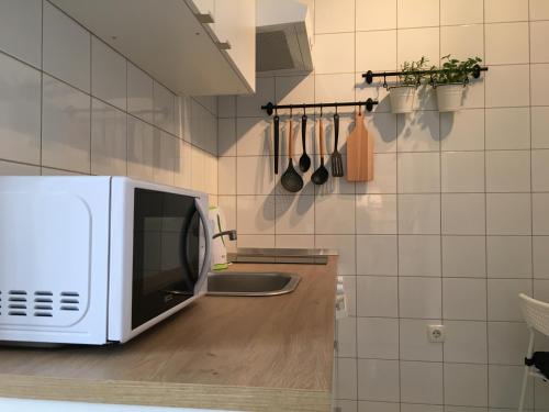 Ett kök eller pentry på Luigi apartments
