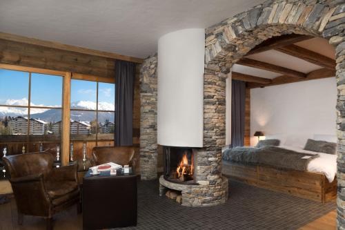 Posezení v ubytování Hostellerie du Pas de l'Ours "Relais et Châteaux"