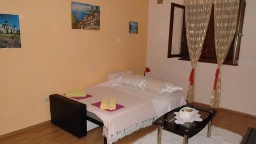 Ένα ή περισσότερα κρεβάτια σε δωμάτιο στο Apartmani A.Teskera