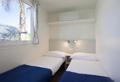 Ένα ή περισσότερα κρεβάτια σε δωμάτιο στο Playa Colorada