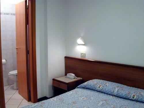 Cama o camas de una habitación en Hotel Astoria