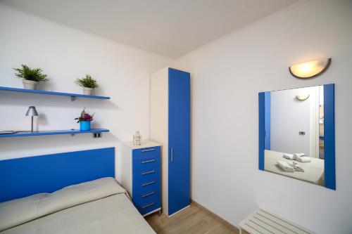 Posteľ alebo postele v izbe v ubytovaní Residence Mediterraneo