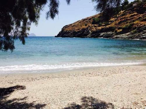 a view of a beach with the ocean at Darsi suites Kythnos in Kithnos