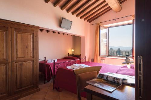 Katil atau katil-katil dalam bilik di Bed & Breakfast Suvereto