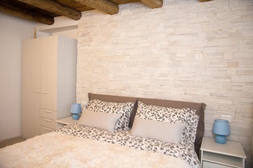 Кровать или кровати в номере Residenza Romantica