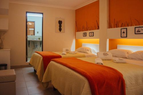 Ein Bett oder Betten in einem Zimmer der Unterkunft Hotel San Felipe