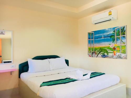 Postel nebo postele na pokoji v ubytování Jarawee Resort