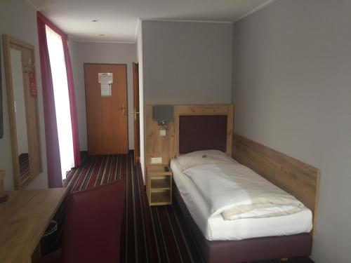 Hotel Süderelbeにあるベッド