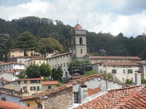 a view of a town with a clock tower at San Gennaro Castello in San Gennaro