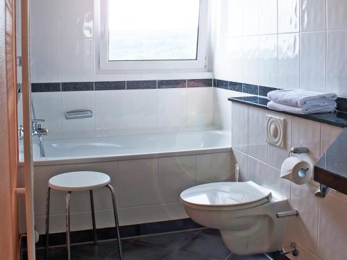 Ванная комната в Berggasthof Hotel Igelwirt