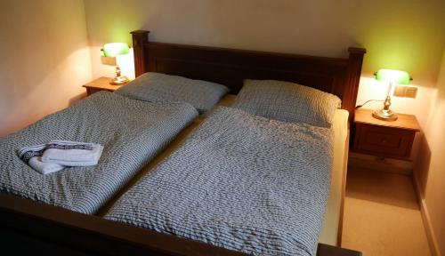 Postel nebo postele na pokoji v ubytování Chaty Lojzovky